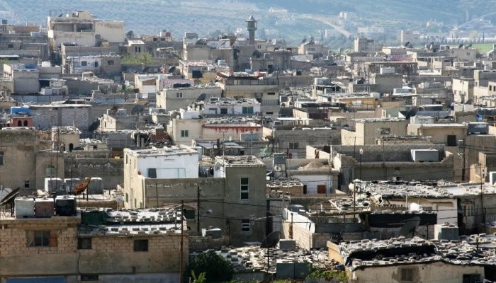 الحكومة تقرّ تنظيم أراضي المخيمات وتسوية أوضاعها وفق مبدأ التعويض