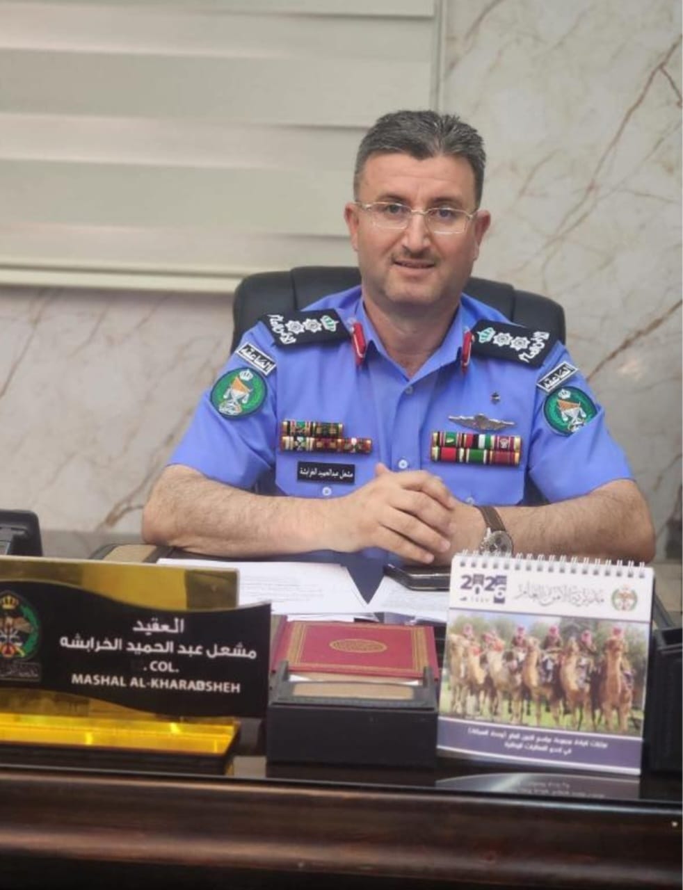 الجروان يهنئ العقيد الخرابشة بالترفيع 