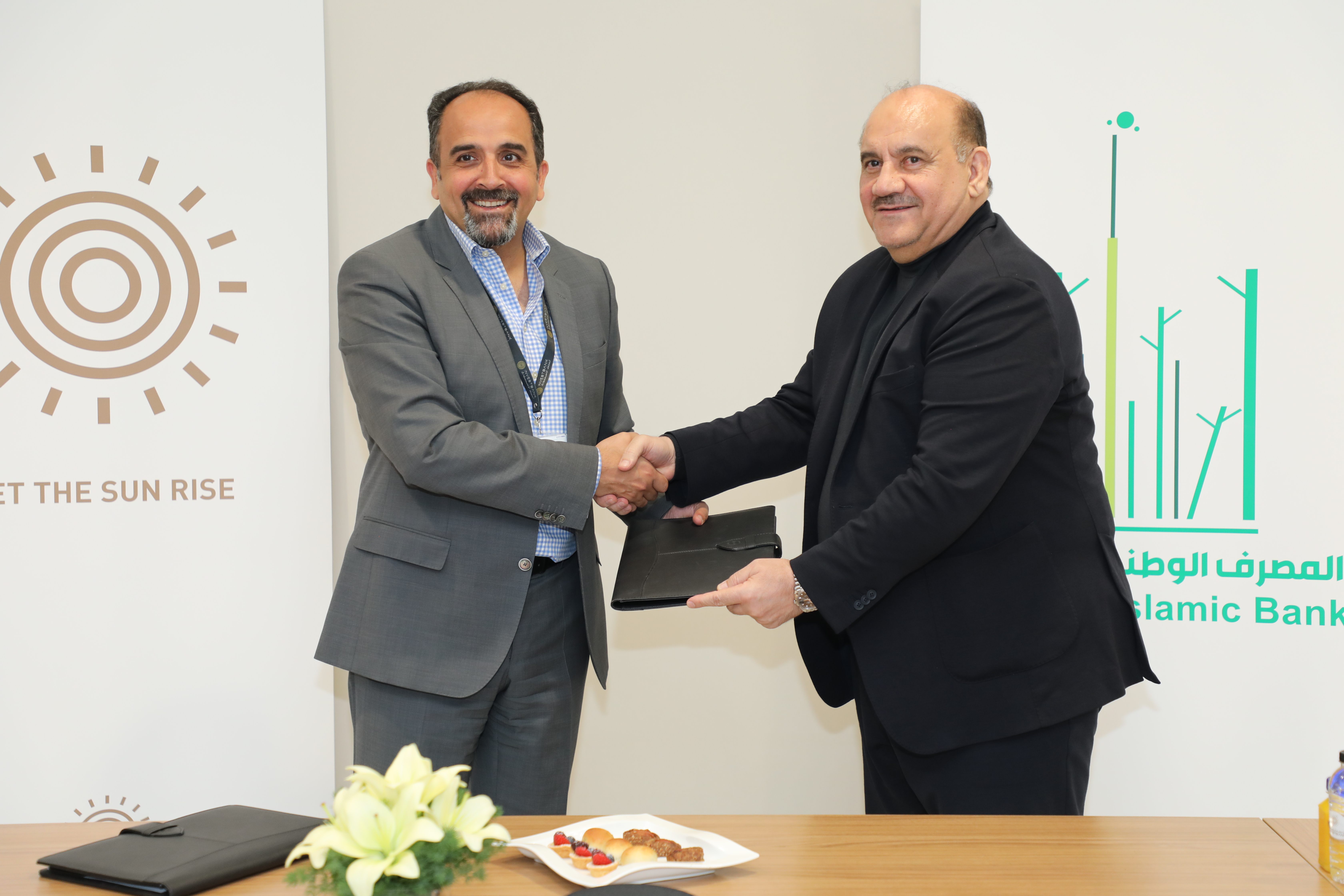 الاستثماري والوطني الإسلامي في العراق يوقعان اتفاقية خدمات استشارية