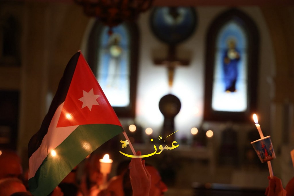 وقفة تضامنية بالشموع أمام كنيسة قلب يسوع في عمّان