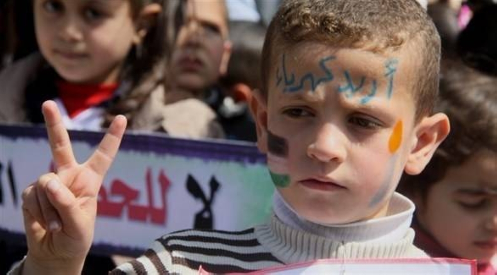أطفال غزة يتظاهرون تنديدًا بالحصار الإسرائيلي 
